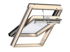 Fenêtre de toit à rotation en bois 55 cm x 118 cm Bois de pin peint en blanc Profilés extérieurs en zinc-titane Vitrage double Thermo 1 VELUX INTEGRA® Solar automatique 